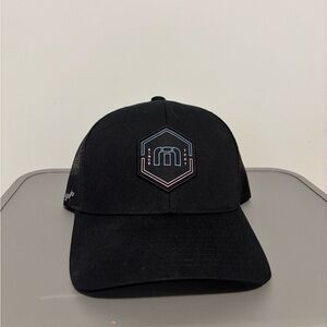 Travis Mathew Black Hat with Subtle Blue and Pink Logo